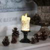 Besinnliches Lichtspiel mit wirbelndem Schneefall