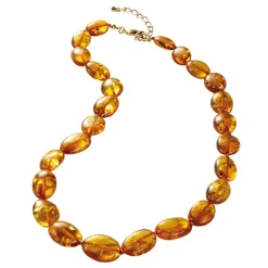 Faszinierend: orange-leuchtender Schmuck aus fossilem Harz